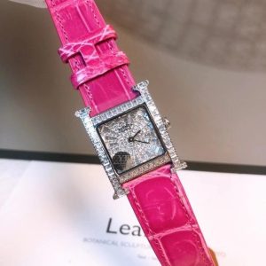 Alternative view of Hermès H-our Diamond Jewelry Watch Case, dial, and meticulously selected purest diamonds Each stone is individually cut before being invisibly set to create dazzling, flat surfaces across every part of the watch. Dimensions: 26mm x 26mm.Features a scratch-resistant sapphire crystal and a vibrant alligator leather strap. A must-have, uniquely versatile jewelry watch for every Hermès enthusiast!